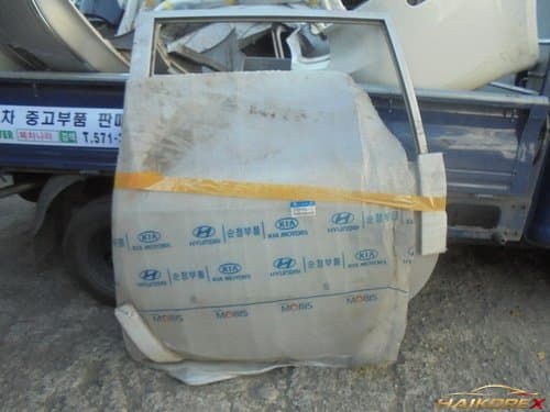 Дверь задняя левая (водительская) Traject XG с молдингом 770033A031A