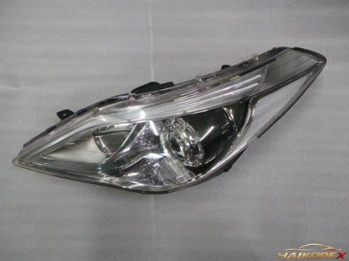 Фара головного света Hyundai Grandeur HG HID 8-контактная (черный безель) - водительская сторона 921013V110