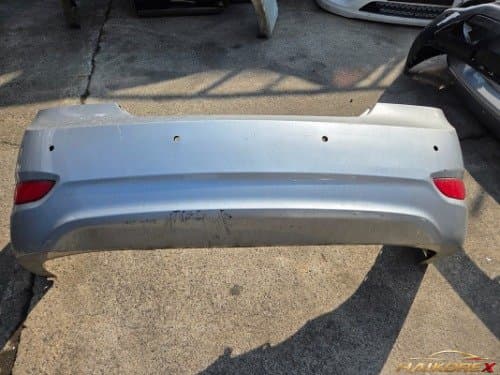 Накладка заднего бампера Hyundai Accent (RB) 866111R000 (4 отверстия под датчик) для 4-дверных