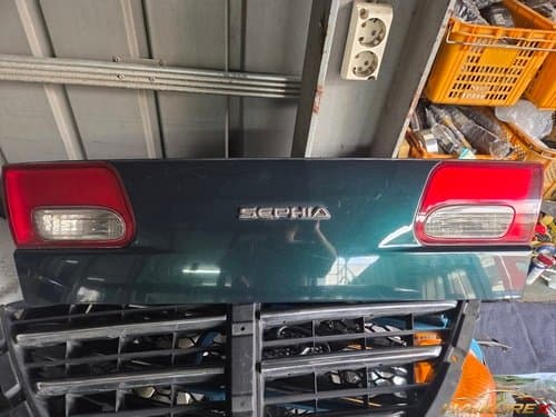 Задний фонарь Hyundai New Sephia в сборе с панелью