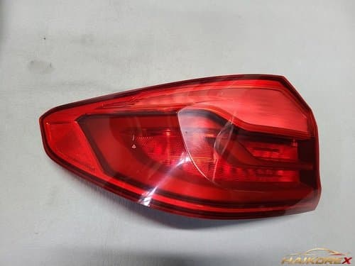 Задний фонарь комбинированный BMW 5 Series 7G30 (G30) левый (водительский) 63217376463, класс B (царапины)