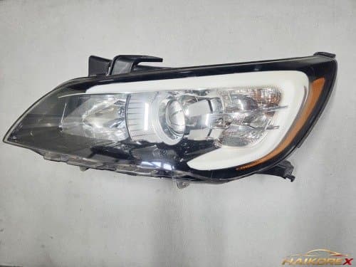 Фара левая Kia K7 (черный безель) 8-контактная 921013R200