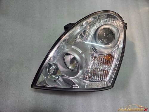 Передняя фара левая Ssangyong Rexton 2 Light галоген 3-контактная 8310108B03