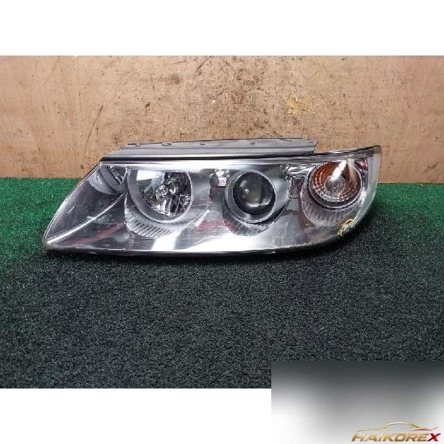 Hyundai Grandeur 2009 — фара передняя левая
