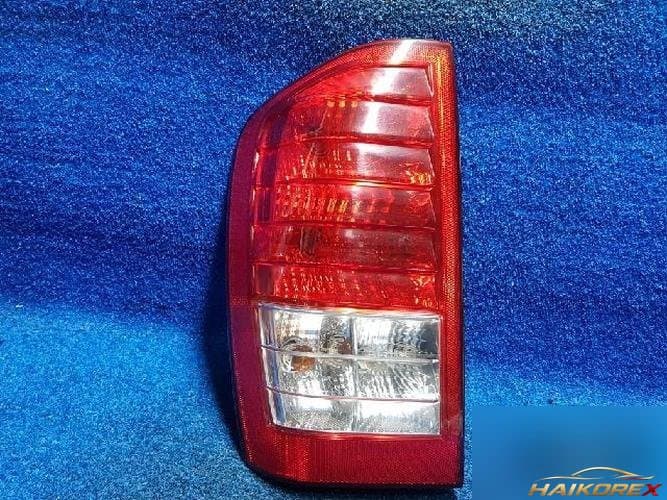 Kia Carnival 2007 — фонарь задний левый наружный