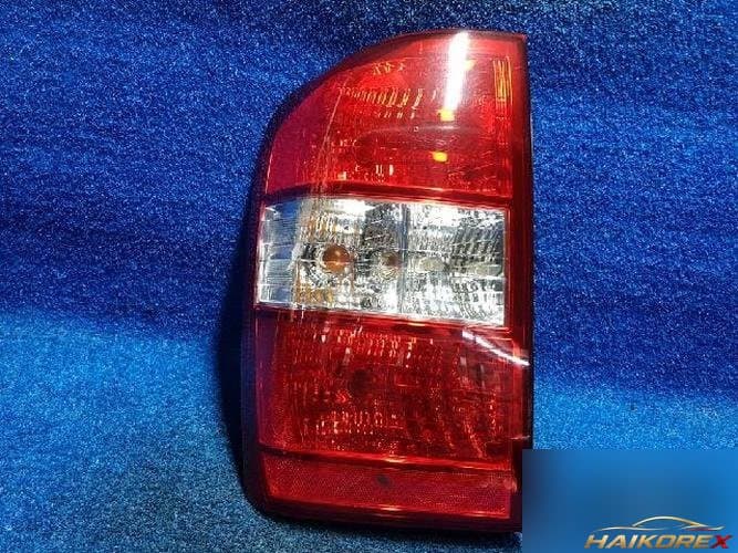 Kia Carnival 2010 — фонарь задний левый наружный