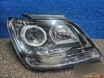 Kia Mohave 2014 — фара передняя