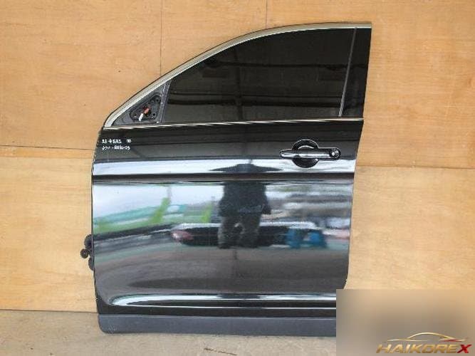 Ford Taurus 2010 — передняя дверь левая
