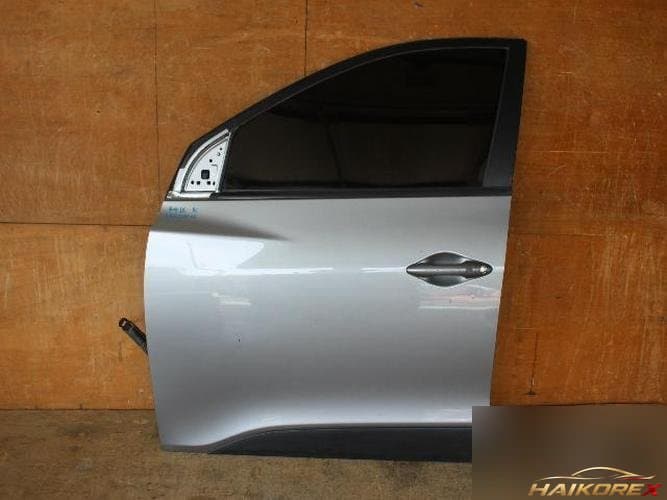 Hyundai Tucson 2010 — передняя дверь левая