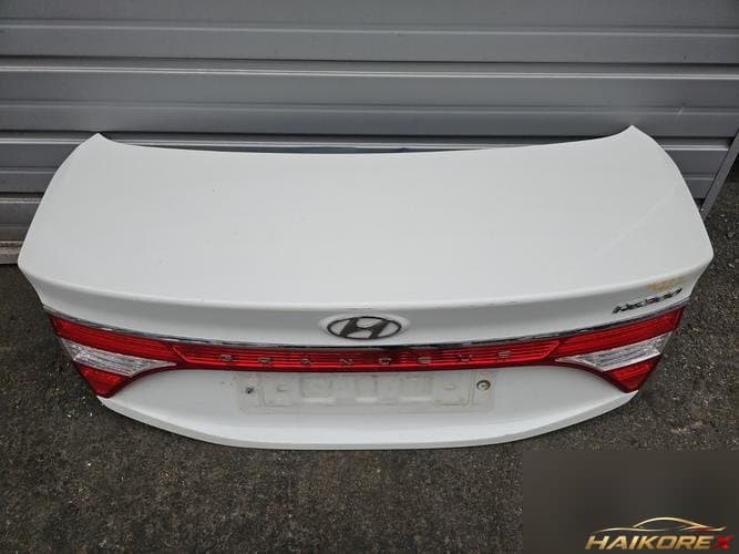 Hyundai Grandeur 2012 — крышка багажника вторая (боковая)