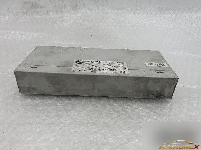 BMW 7 Series 2011 — модуль крышки багажника 61357284597