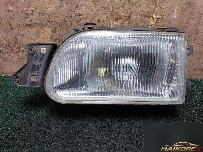 Kia Tauren 2001 — фара левая AA10051040