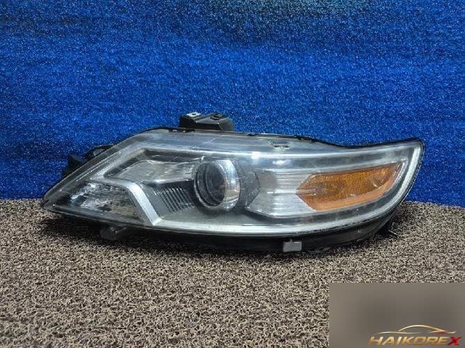 Ford Taurus 2011 — фара передняя левая