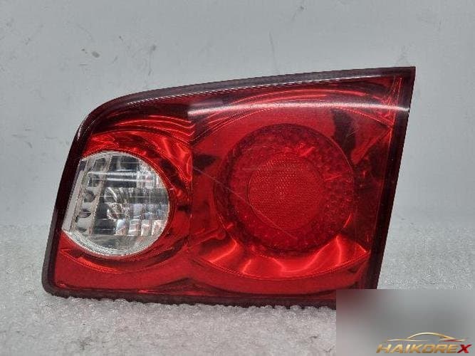 Kia Lotze 2007 — белый финишер крышки багажника